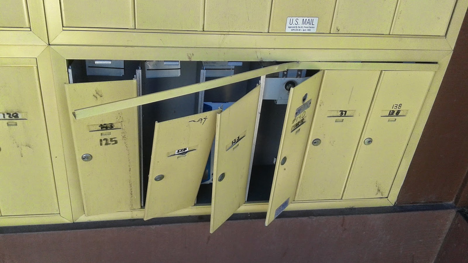 The Postal Tsunami by Mel Carriere Tax Season Means Broken Mail Boxes