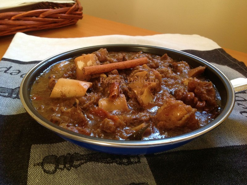 Foody Delight Khara Masala Gosht Goat Meat cooked in and with Whole