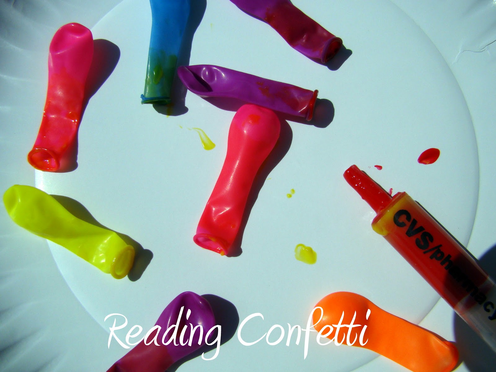 Painting with Water Balloons & Kid's Coop Link Party 11 Reading Confetti