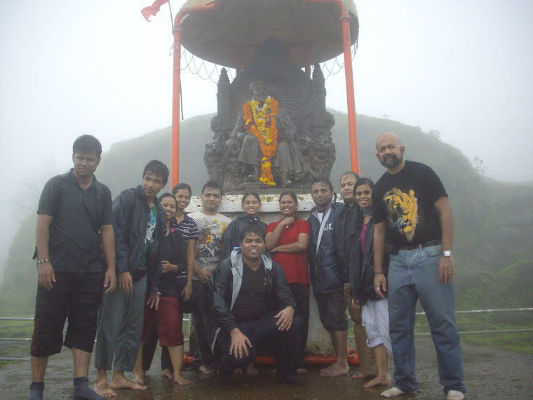 In front of the statue of Chhatrapati shivaji  near the "Market Place" ruins.