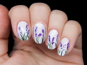 Delicate lavender blossoms by @chalkboardnails
