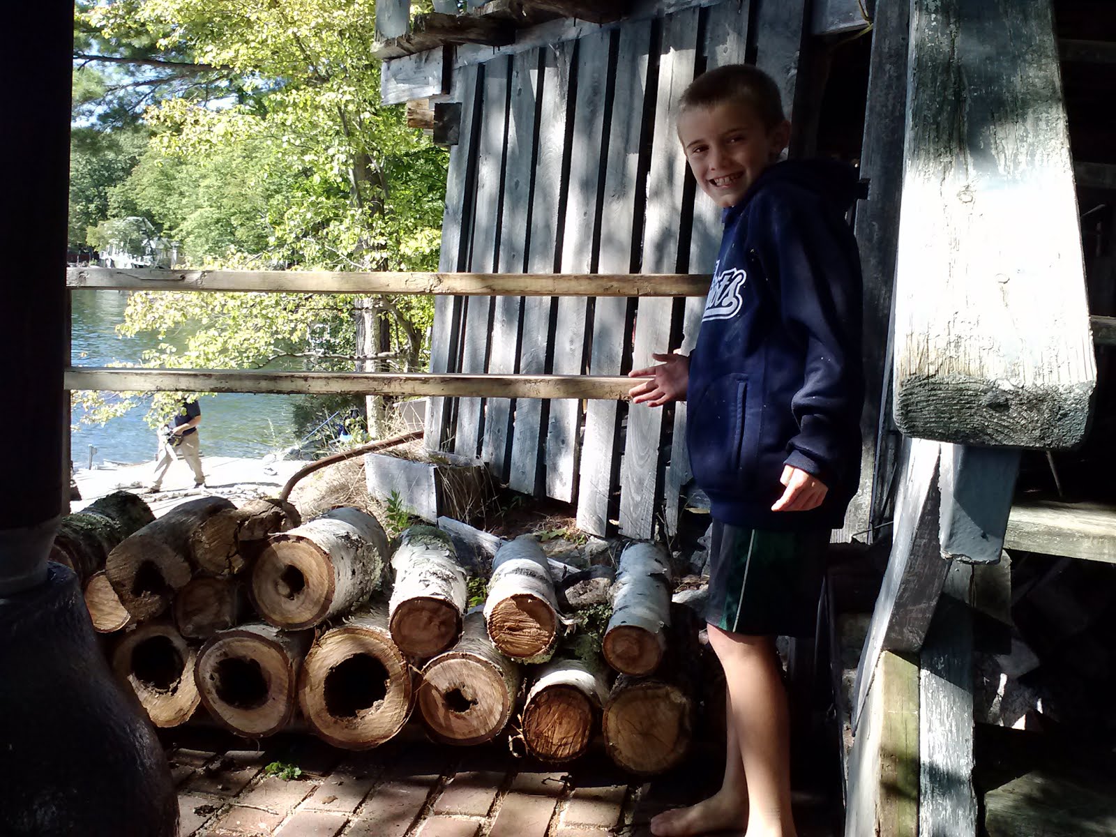 Jonas making progress on the wood pile