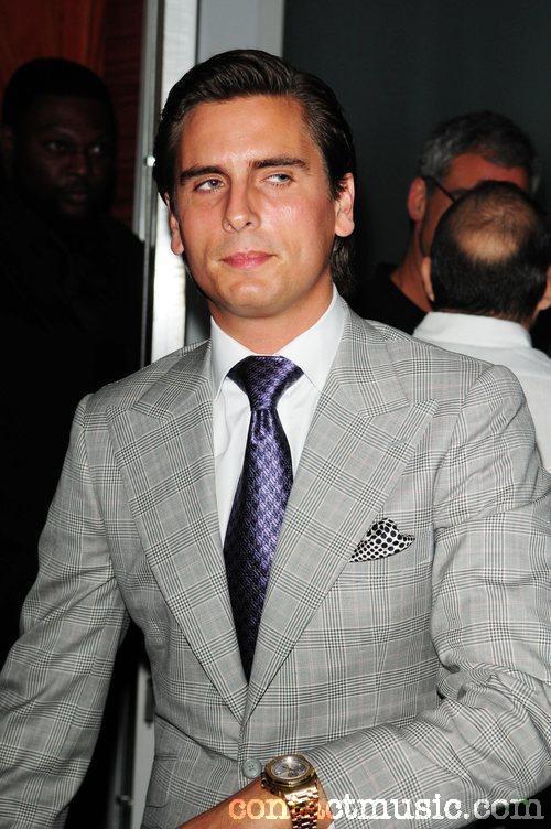 scott_disick_arrives_at_the_grand_re-opening_of_club_mia_biscayne_in_miami_2802754.jpg