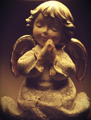 ceramic angel praying