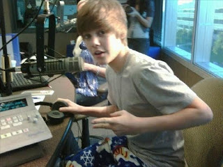 Justin Bieber recording a  song