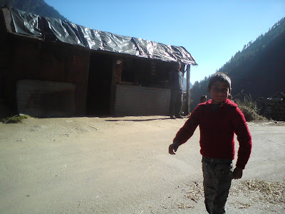 A smiling chirpy village kid wishing us Happy Diwali in the mountains