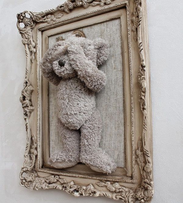 What's new At Frame By Frame Put old stuffed animal in a frame.