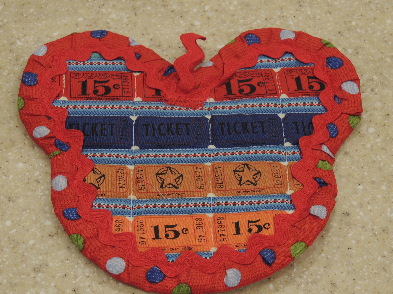 Seriously..I think it needs stitches. Mickey Mouse Hot Pad