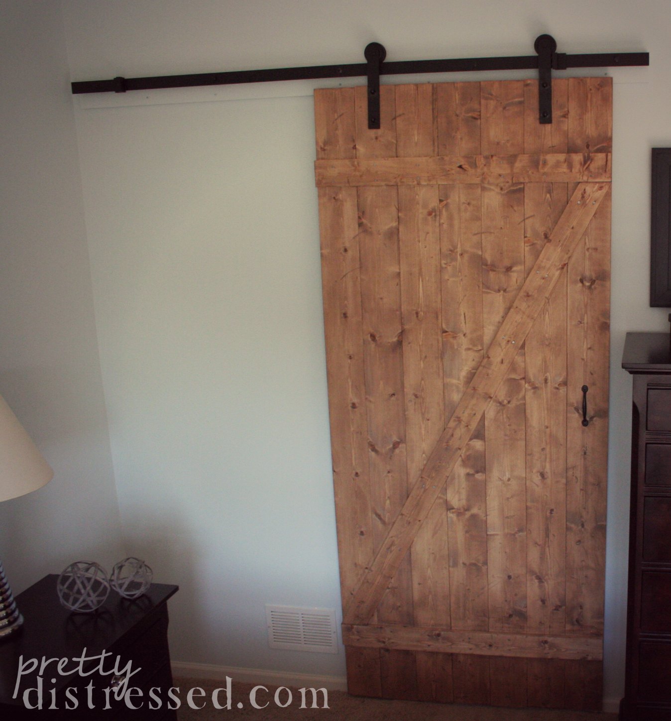 Pretty Distressed DIY Distressed Sliding Barn Door