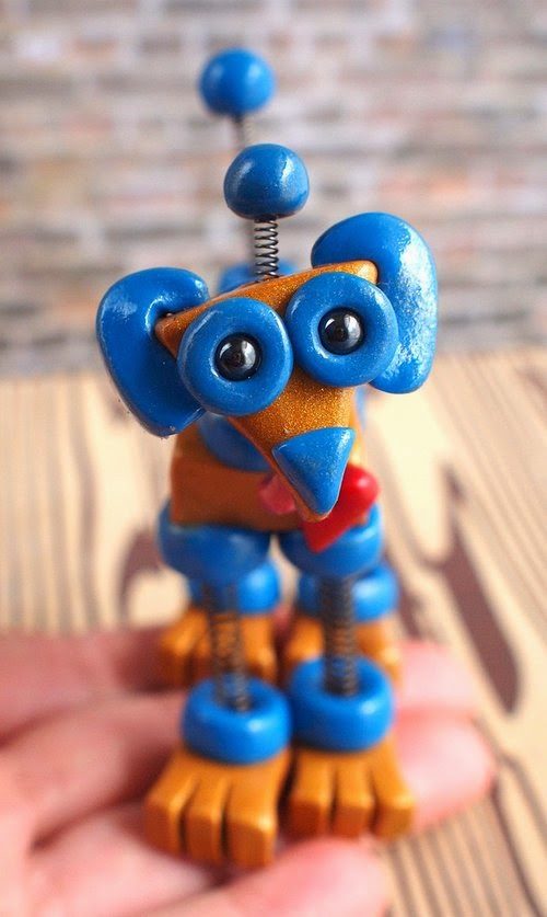 07-Mini-Robot-Dog-HerArtSheLoves-Clay-Robot-World-Sculptures-www-designstack-co