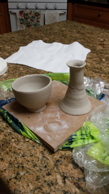 Parts of a ceramic goblet in progress.