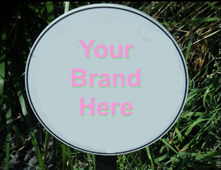 Sign with a "Your Brand Here" message