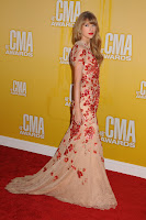 Taylor Swift glamorous in a floor length dress