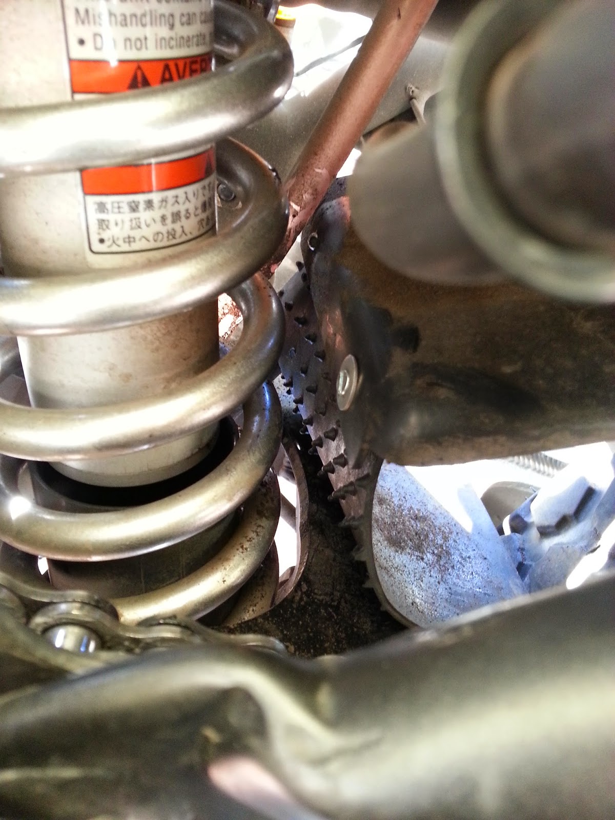 My KLR 650 Mods and farkles KLR650 Rear shock mud flap