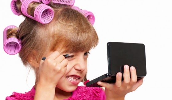 little girls playing with makeup