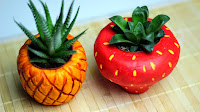 http://www.makoccino.com/2015/05/diy-pineapple-strawberry-planters.html