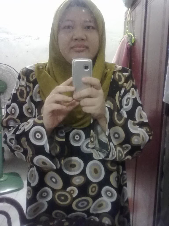 Berbaju kurung