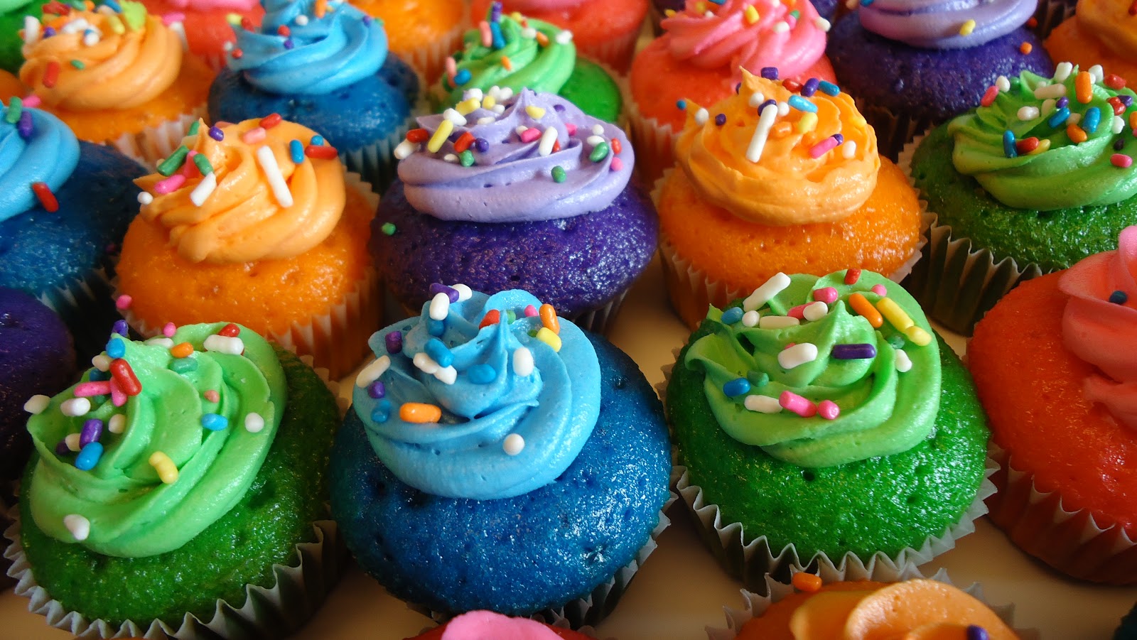 Unique Party Food to Go All the Colors of the Rainbow Mini Cupcakes