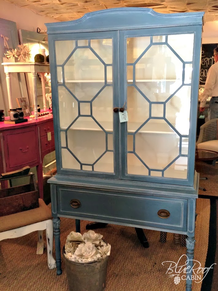 blue roof cabin White Wax