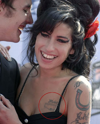 Amy Winehouse Tattoos Getty Images Amy had a collection of classic pinup