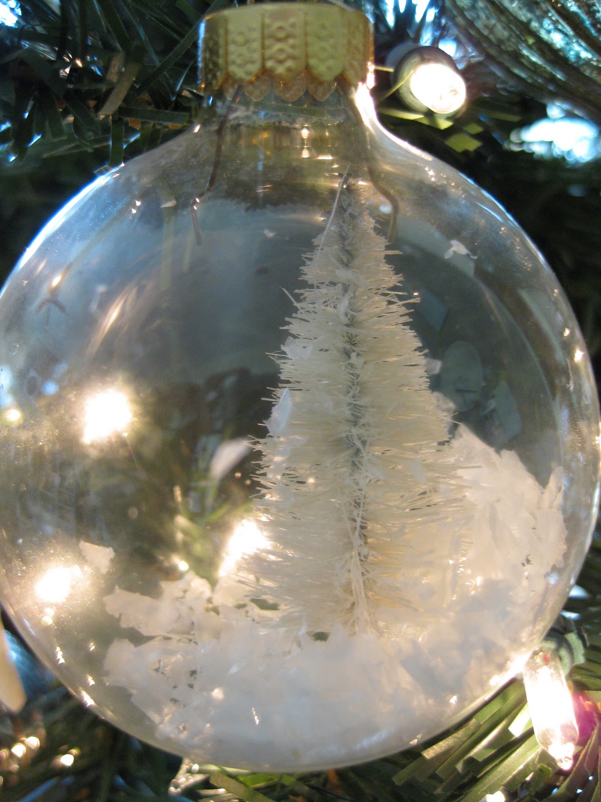 Primp Junktion white christmas mantel, bleaching bottle brush trees