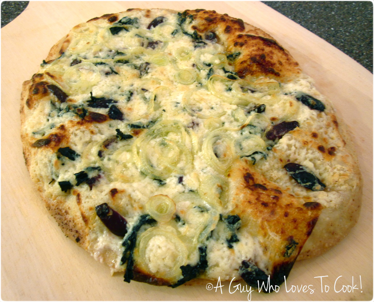 A Guy Who Loves to Cook! White Asiago Pizzaish Food