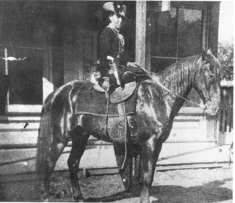 Belle Starr posing for the cameraman during her trial for stealing a horse