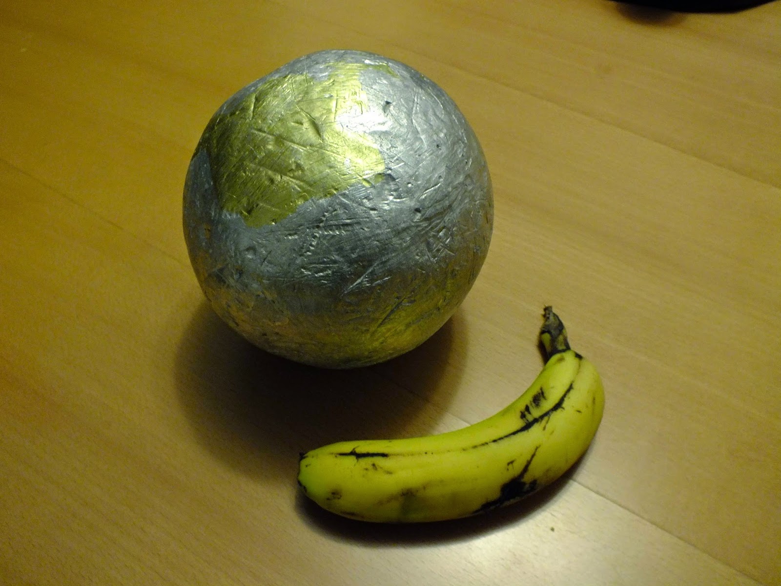 World Of Technology Cigarette Foil Ball, Cut in Half