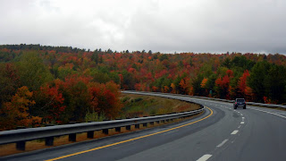 Driving through New Hampshire during peak Fall season in New England
