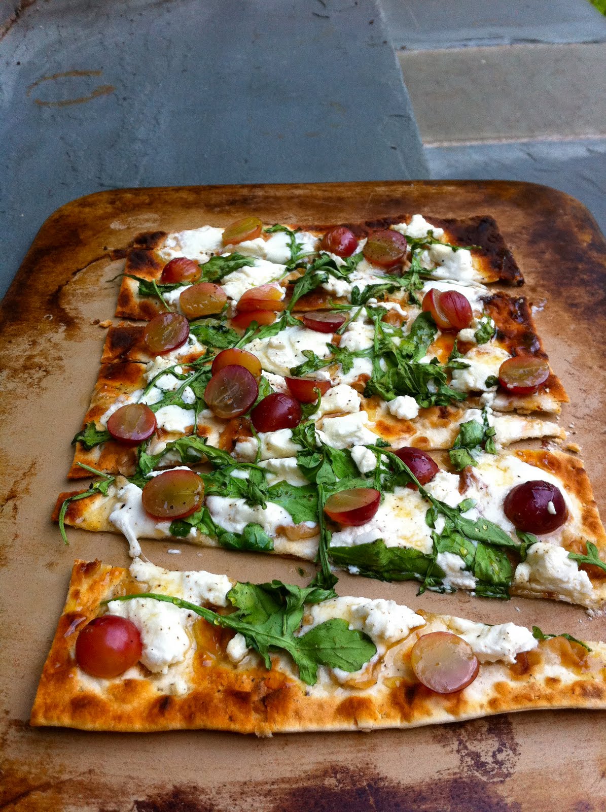 Food Jams arugula honey grape and cheese flatbread