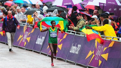 Gold medal winner Tiki Gelana of Ethiopia