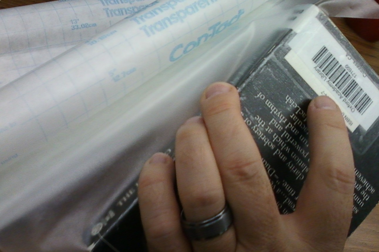 Smells Like Library BOOK PROCESSING Covering Paperbacks With Contact