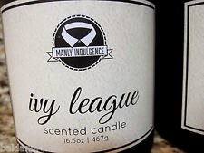 Image of a scented candle that says "MANLY INDULGENCE" with a shirt collar logo and the scent is called "ivy league."