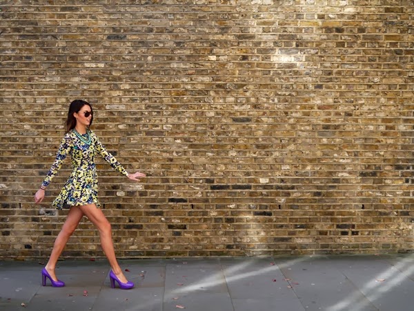 H&M floral dress and Christian Dior purple heels on a sunny day in Mayfair