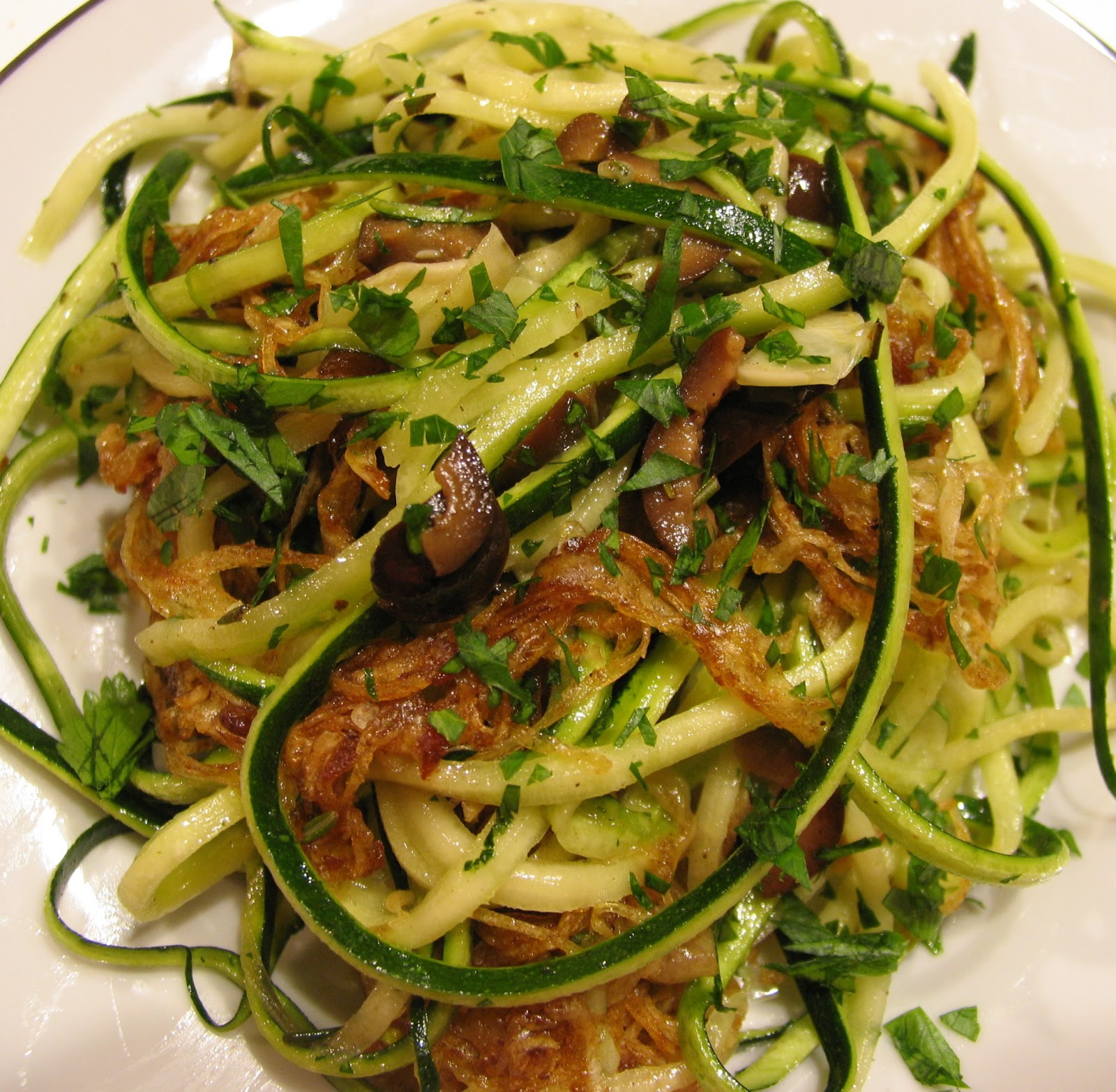 Raw World Order Zucchini Pasta with Caramelized Onions