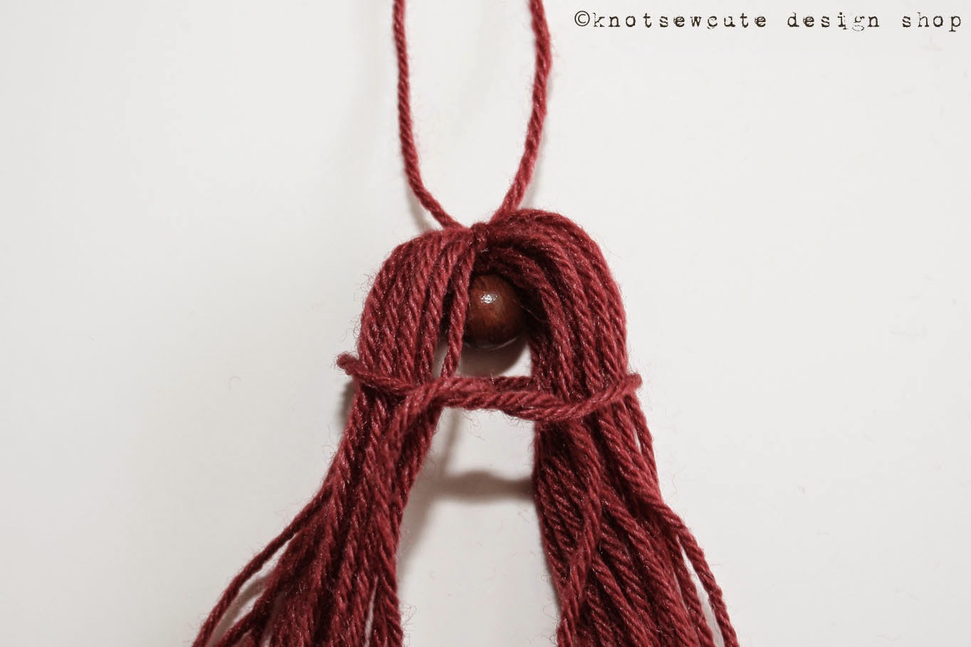 knot•sew•cute design shop how to make a tassel.