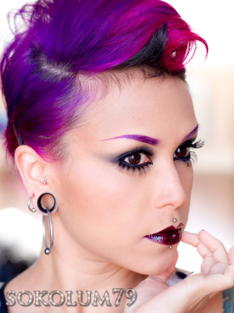 Dark smoky eye and victory roll with side cut