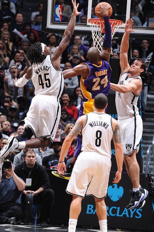 Kobe Bryant Dunks on Humphries, Nets [Video]