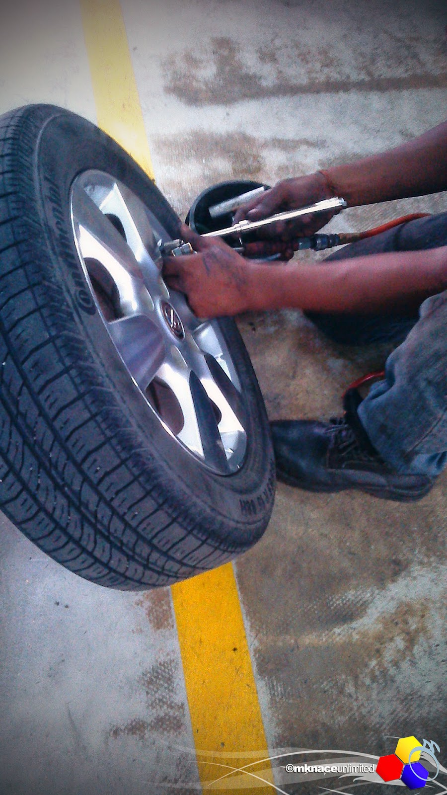 Tampal tayar kereta yang bocor