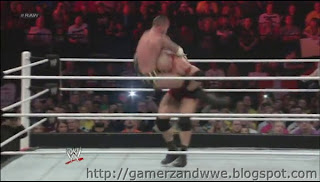 Ryback performs a power slam on CM Punk