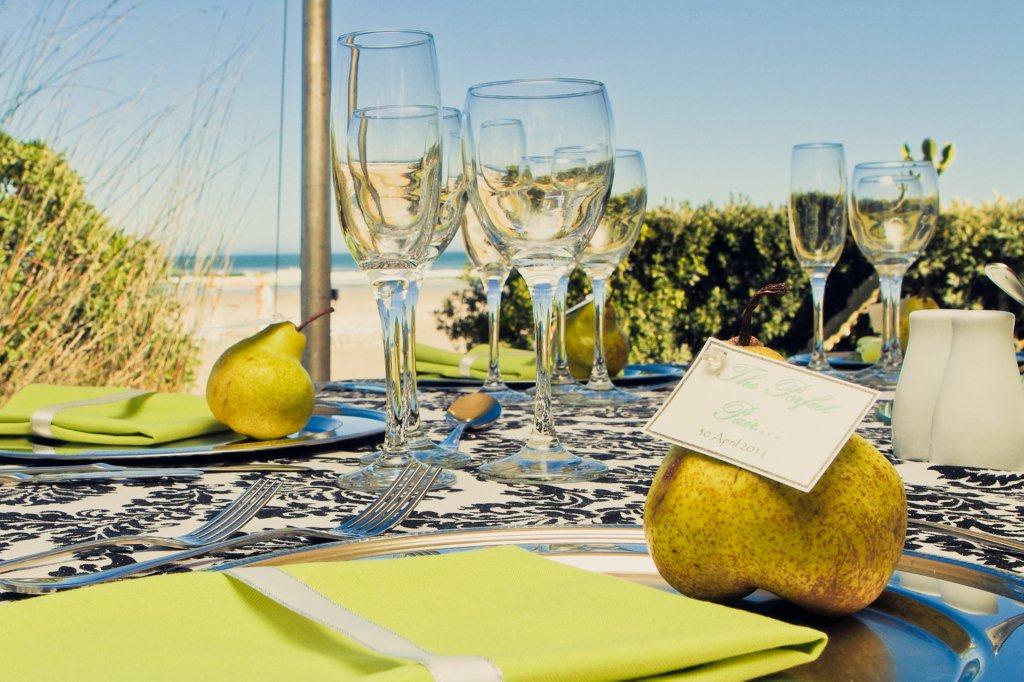  white and pear green wedding took place in Melkbosstrand on the beach 