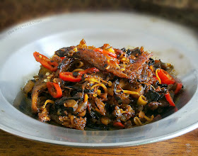 fried salted fish with onion, chilli and assam