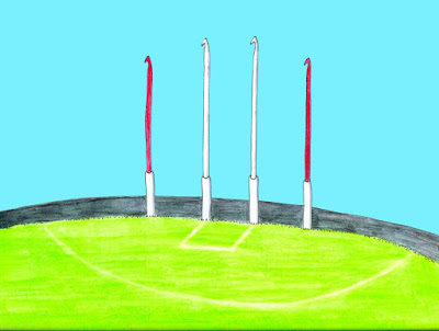A drawing of an Australian Rules footy field with crochet hooks as goal posts.