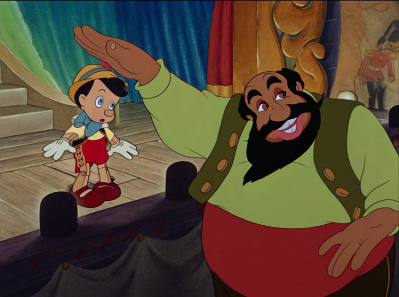 mangiafuoco-e-il-burattino-in-una-scena-del-film-d-animazione-pinocchio-1940-142048.jpg