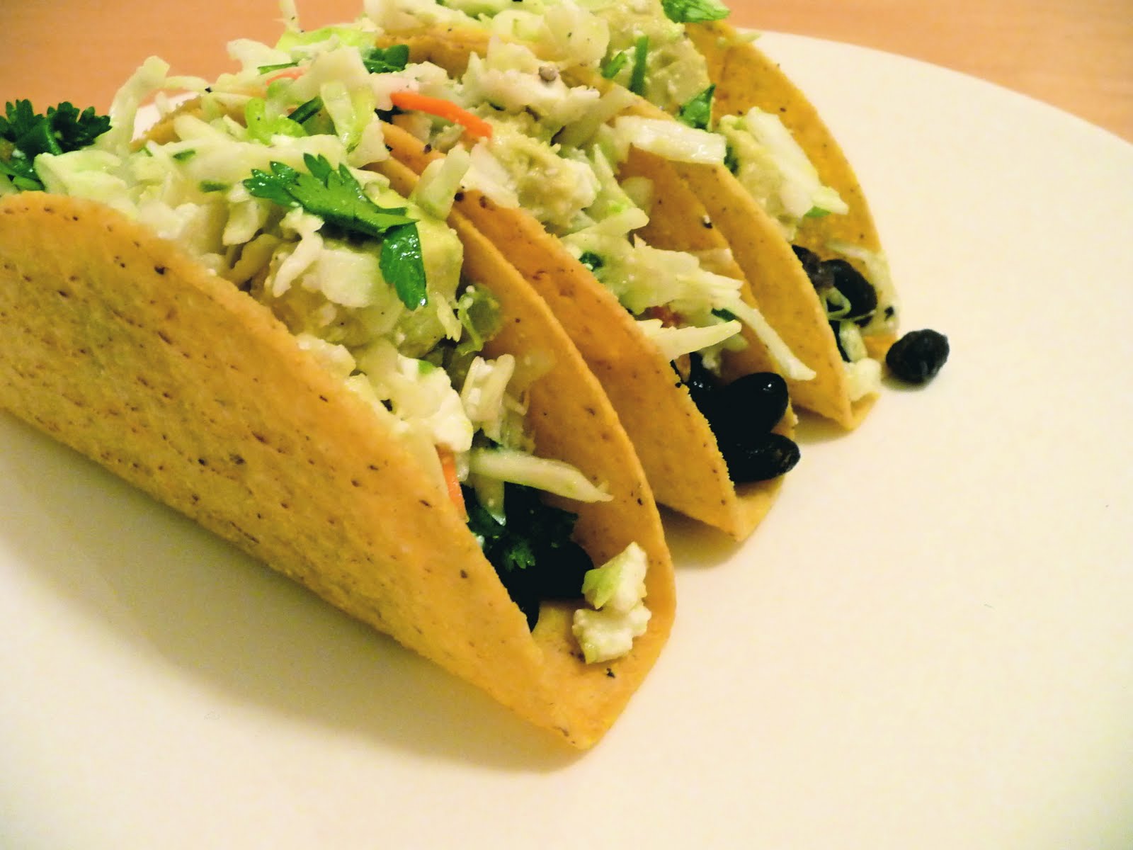 dinner party crispy black bean tacos with feta slaw
