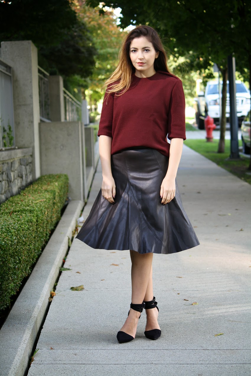 fashion blog street style wearing burgundy top, midi leather skirt, nastygal heels
