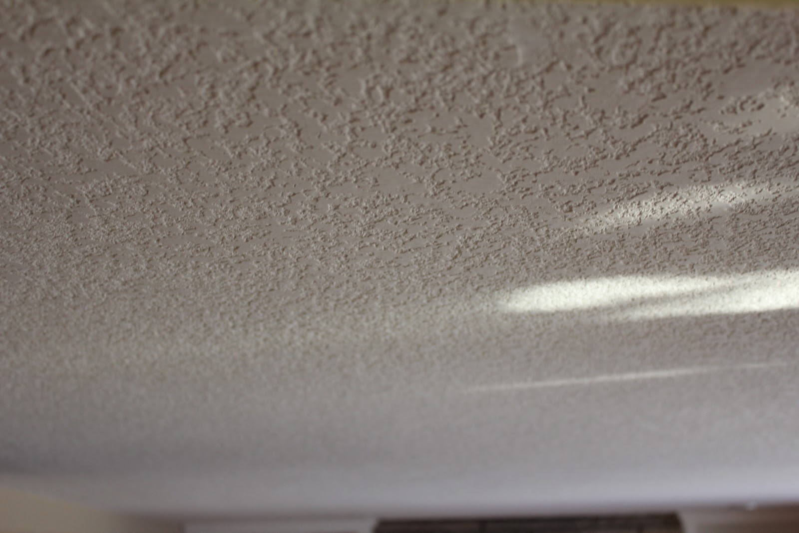 Popcorn texture removal, Knockdown application, step 6 Priming with