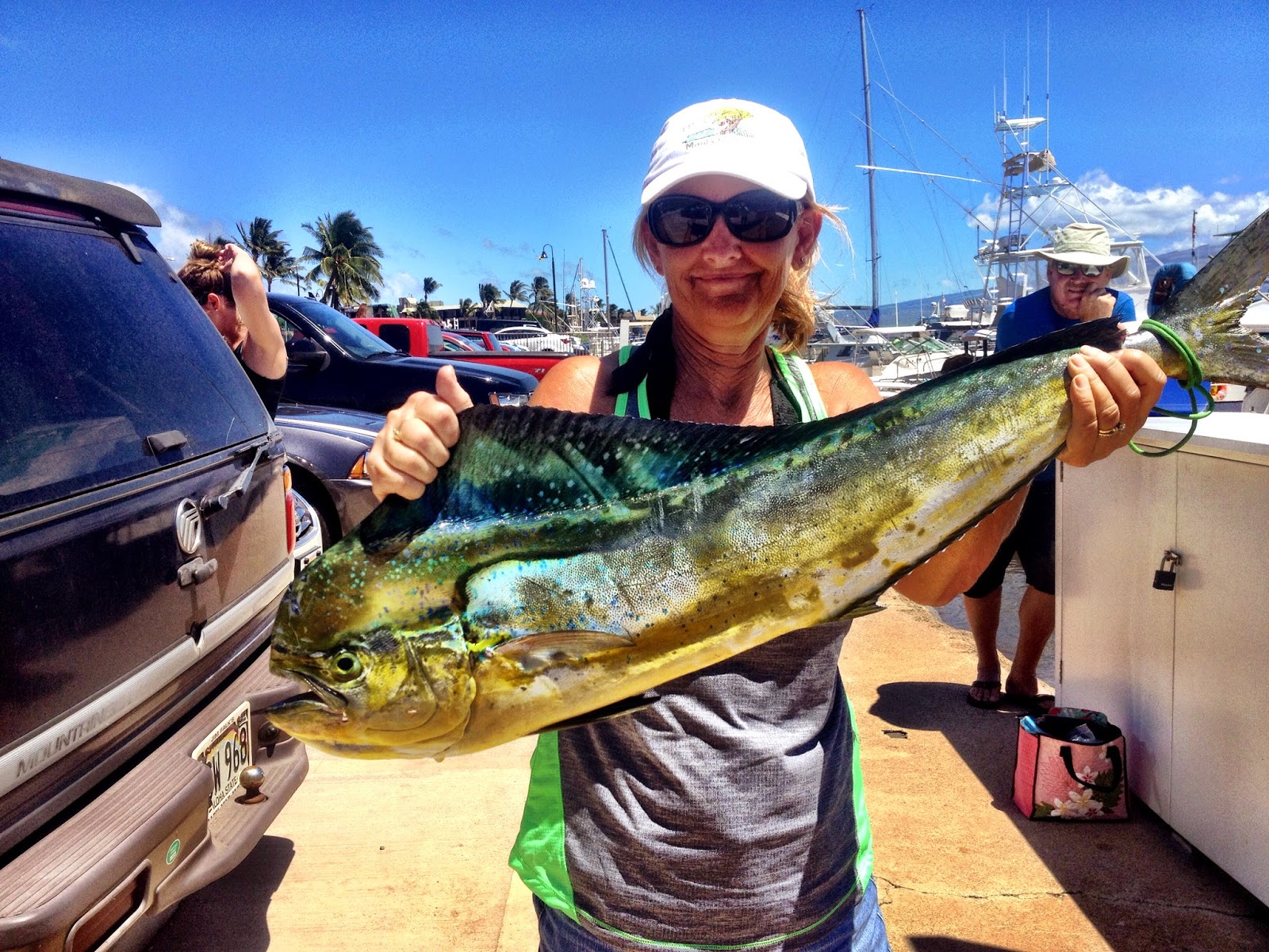 LuAnn catches a Mahi Mahi while sport fishing last week on Rascal