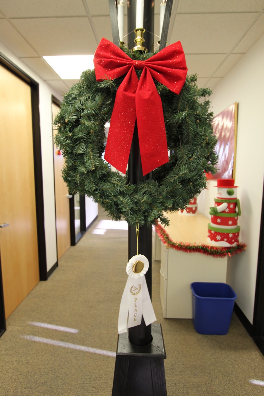 the office holiday pole decorating contest midcentury modern remodel