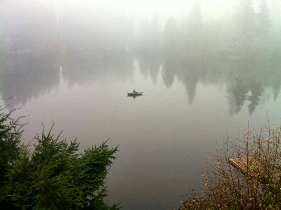 Foggy Morning Fisherman on the lake